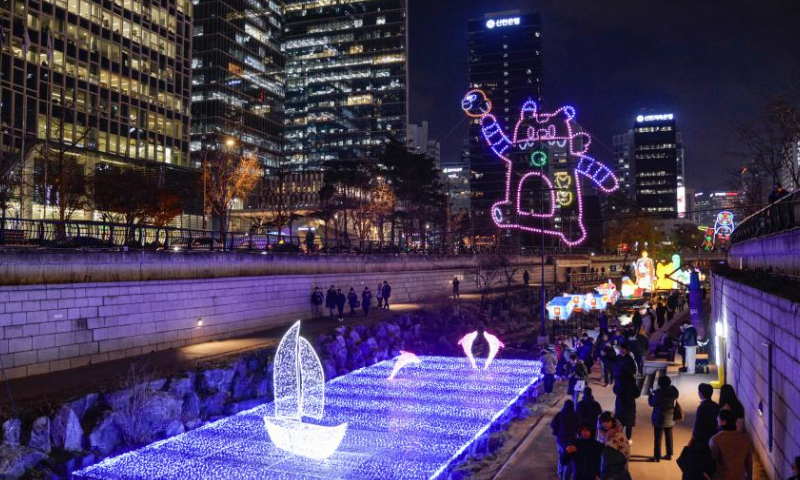 This photo taken on Dec. 16, 2024 shows decorations of 2024 Seoul Winter Festa at Cheonggyecheon in Seoul, South Korea. This ongoing event will last until January 5, 2025. (Xinhua/Xu Qin)