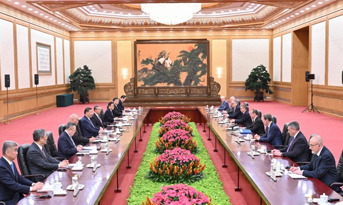 Xi Jinping, general secretary of the Communist Party of China Central Committee and Chinese president, meets with Chairman of the United Russia party Dmitry Medvedev at the Great Hall of the People in Beijing, capital of China, Dec. 12, 2024. (Xinhua/Yin Bogu)