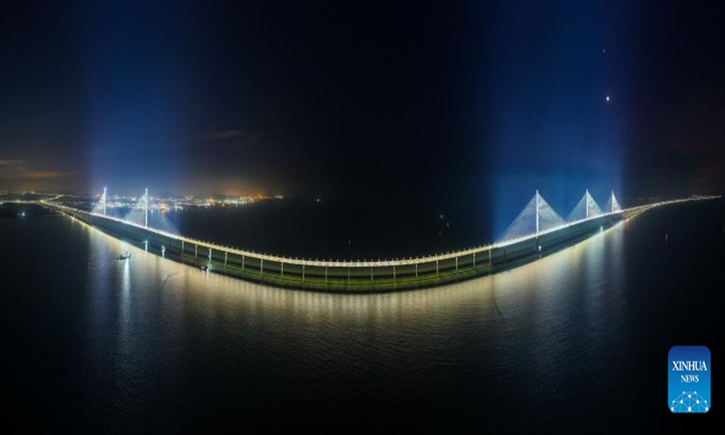 An aerial panoramic drone photo taken on Dec. 4, 2024 shows a view of Gaolan Port Bridge (with twin main towers on the left) and Huangmaohai Bridge (with three main towers on the right) in south China's Guangdong Province. (Photo: Xinhua)