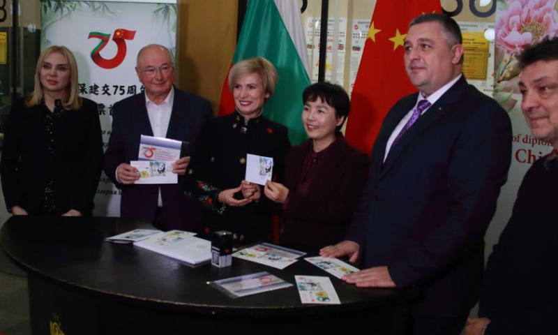 The launch ceremony of a postage stamp in celebration of the 75th anniversary of the establishment of diplomatic relations between Bulgaria and China is held in Sofia, Bulgaria, on Dec. 18, 2024. A special postage stamp marking the 75th anniversary of the establishment of diplomatic relations between Bulgaria and China was released at the ceremony here on Wednesday. (Photo by Marian Draganov/Xinhua)