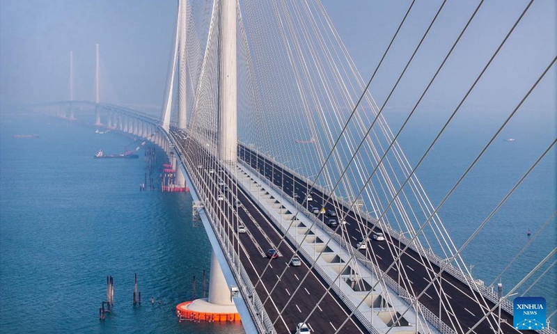 An aerial drone photo taken on Dec. 11, 2024 shows vehicles running on the Huangmaohai Bridge in south China's Guangdong Province. (Photo: Xinhua)