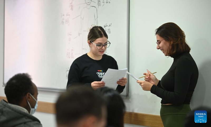 Students simulate a visit to a doctor in Chinese at the University of Malta in Msida, Malta, on Dec. 11, 2024. (Photo: Xinhua)