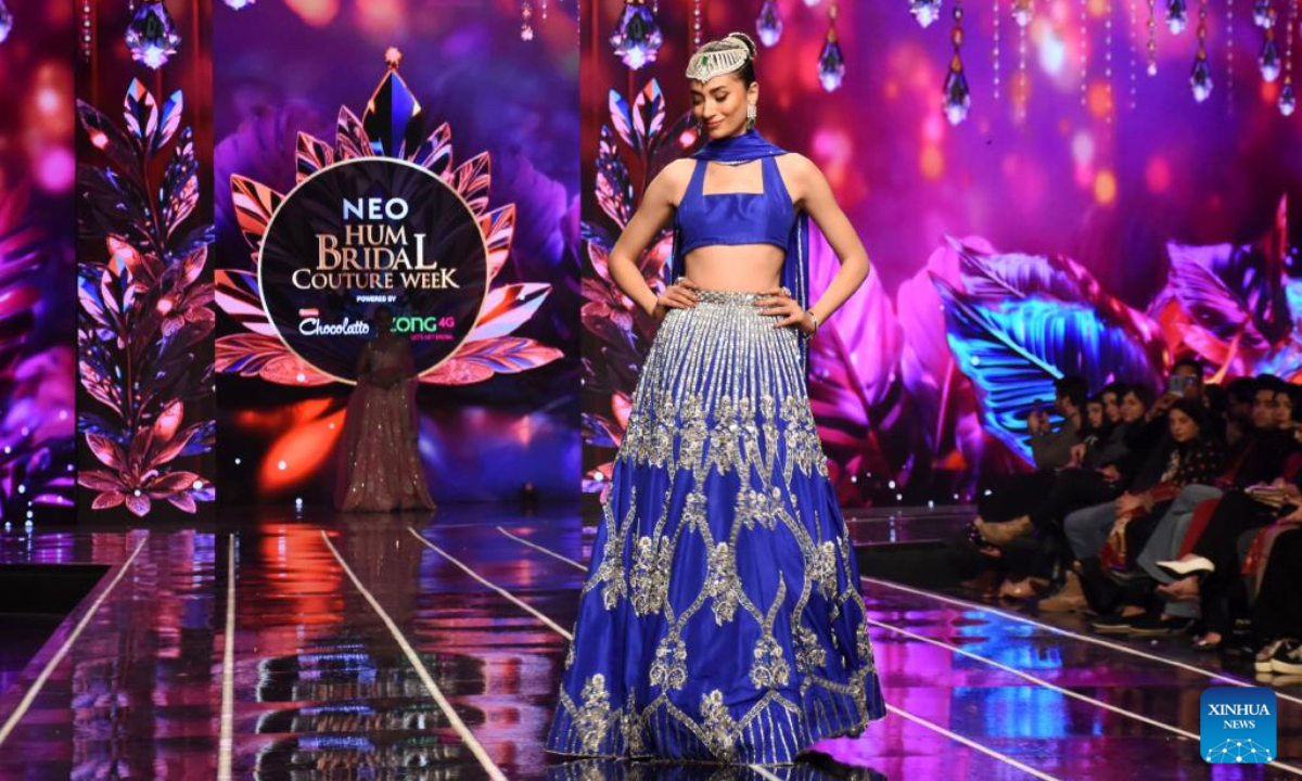 A model presents a creation on the first day of the Neo HUM Bridal Couture Week in Lahore, Pakistan on Dec. 20, 2024. A three-day bridal fashion week kicked off in Lahore on Friday. (Photo: Xinhua)