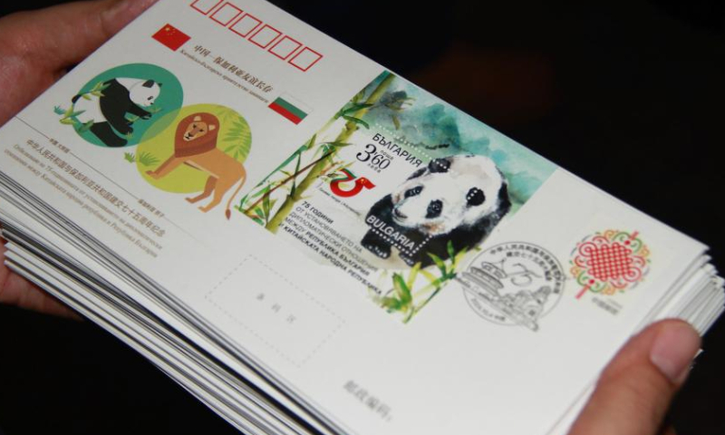 Commemorative envelopes with postage stamps in celebration of the 75th anniversary of the establishment of diplomatic relations between Bulgaria and China are seen at the launch ceremony in Sofia, Bulgaria, on Dec. 18, 2024. A special postage stamp marking the 75th anniversary of the establishment of diplomatic relations between Bulgaria and China was released at the ceremony here on Wednesday. (Photo by Marian Draganov/Xinhua)