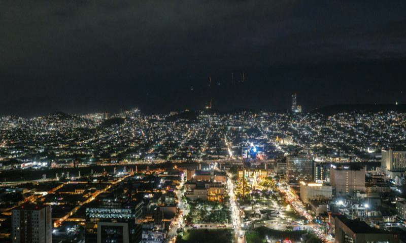 This aerial drone photo shows a night view of Monterrey in Mexico, Dec. 10, 2024. Monterrey, the capital of Nuevo Leon in northeastern Mexico, is the country's third-largest city, renowned for its thriving industrial and commercial activities. As an important economic hub in Mexico, Monterrey is home to numerous multinational companies and manufacturing centers. (Xinhua/Li Muzi)