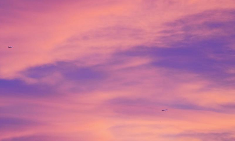 Airplanes fly in the morning light in Beijing, capital of China, Dec. 16, 2024. (Xinhua/Chen Yehua)