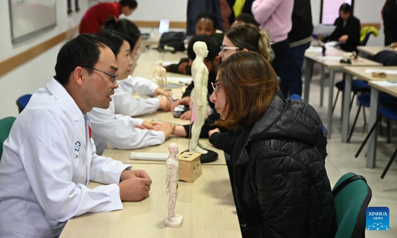 Members of the 20th Chinese medical team for Malta offer free health consultations and clinical services to students at the University of Malta in Msida, Malta, on Dec. 11, 2024. (Photo: Xinhua)