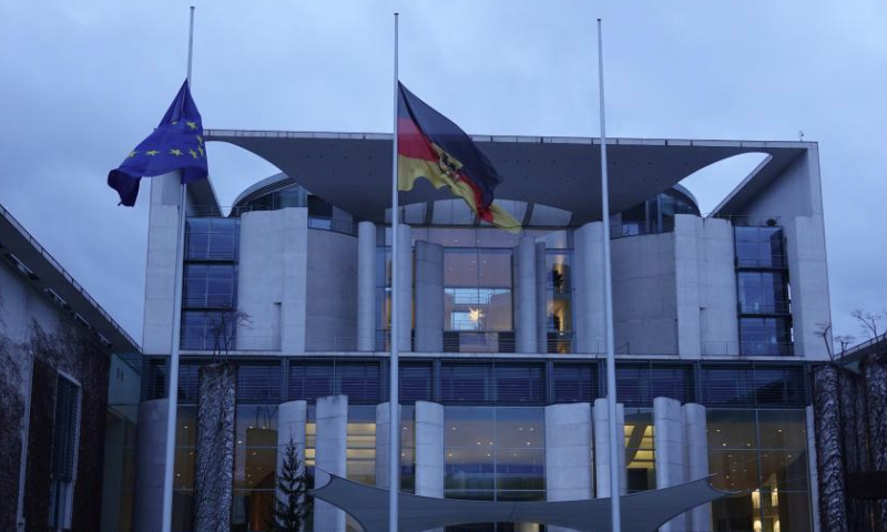 Flags fly at half-mast at the German Chancellery in Berlin, Germany, Dec. 21, 2024. German Federal Minister of the Interior Nancy Faeser ordered Saturday morning that all flags at all federal buildings be flown at half-mast nationwide to mourn the victims of a tragic attack at a Christmas market in the German city of Magdeburg on Friday night, where a car rammed into a crowd, killing at least five people and injuring 200 others. (Xinhua/Liu Yang)