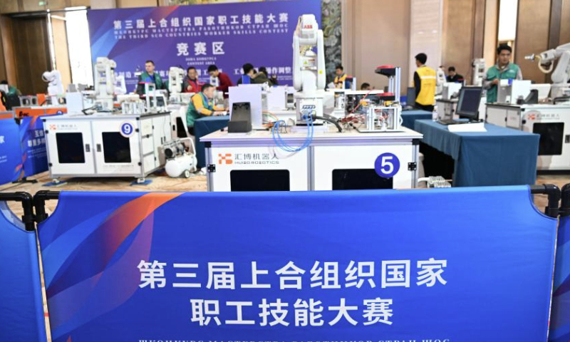 Participants compete in the third SCO Countries Worker Skills Contest in Qingdao, east China's Shandong Province, Dec. 18, 2024. The contest kicked off on Wednesday in Qingdao, attracting skilled workers competing in three programs. (Xinhua/Li Ziheng)