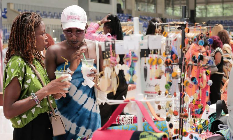 People visit the 5th edition of Ivorian market for brands and creations in Abidjan, Cote d'Ivoire, Dec. 22, 2024. (Photo by Laurent Idibouo/Xinhua)