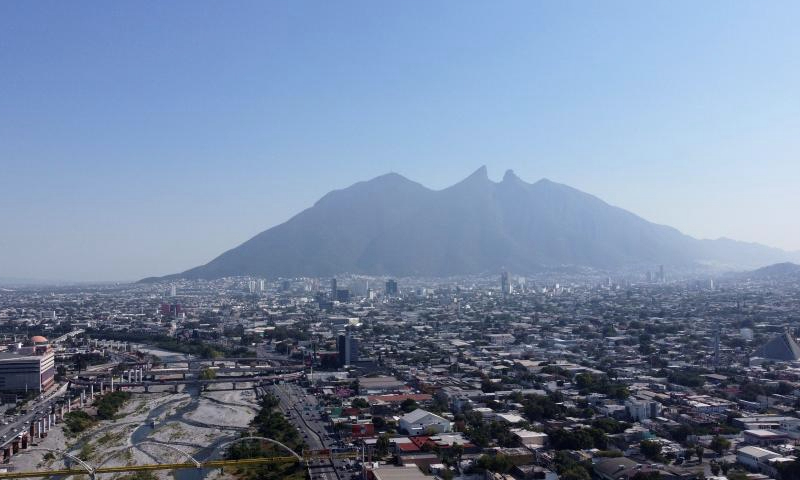 This aerial drone photo shows a view of Monterrey in Mexico, Dec. 12, 2024. Monterrey, the capital of Nuevo Leon in northeastern Mexico, is the country's third-largest city, renowned for its thriving industrial and commercial activities. As an important economic hub in Mexico, Monterrey is home to numerous multinational companies and manufacturing centers. (Xinhua/Wu Hao)