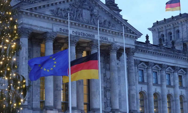 Flags fly at half-mast at the German Bundestag in Berlin, Germany, Dec. 21, 2024. German Federal Minister of the Interior Nancy Faeser ordered Saturday morning that all flags at all federal buildings be flown at half-mast nationwide to mourn the victims of a tragic attack at a Christmas market in the German city of Magdeburg on Friday night, where a car rammed into a crowd, killing at least five people and injuring 200 others. (Xinhua/Liu Yang)