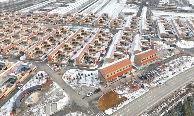 An aerial drone photo shows a resettlement area in Minhe Hui and Tu Autonomous County, northwest China's Qinghai Province, Dec. 12, 2024. (Xinhua/Du Xiaowei)