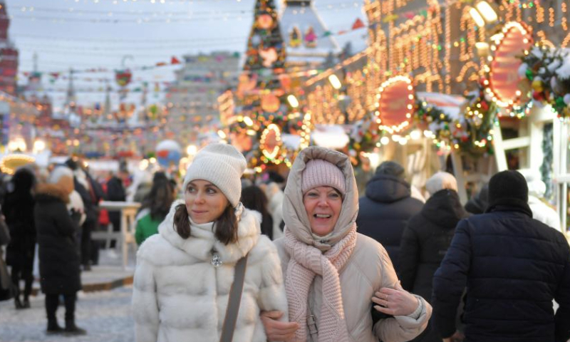 People visit a street market at Red Square in Moscow, Russia, on Dec. 14, 2024. (Photo by Alexander Zemlianichenko Jr/Xinhua)