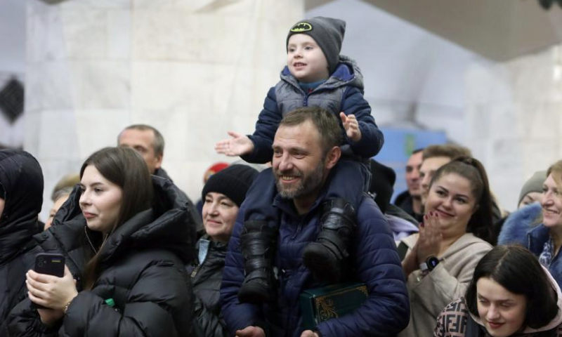 People enjoy a New Year musical concert held at a subway station in Kharkiv, Ukraine, on Dec. 11, 2024. (Photo by Peter Druk/Xinhua)