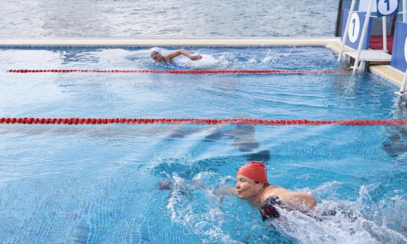 People swim during a winter swimming race in Vladivostok, Russia, Dec. 21, 2024.

Vladivostok held a winter swimming festival on Saturday and attracted many local residents and tourists to participate. (Photo by Guo Feizhou/Xinhua)