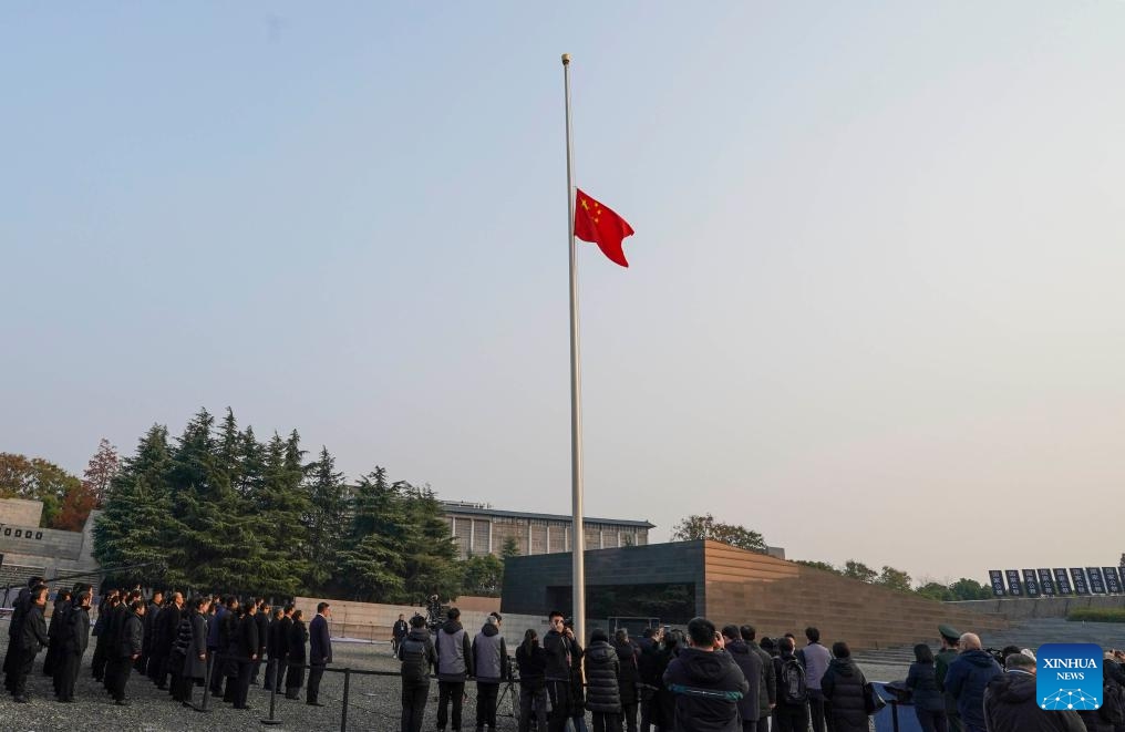 China's national flag flies at half mast at the Memorial Hall of the Victims in Nanjing Massacre by Japanese Invaders in Nanjing, capital of east China's Jiangsu Province, Dec. 13, 2024. Friday marks the 11th national memorial ceremony for the Nanjing Massacre victims. (Xinhua/Li Bo)