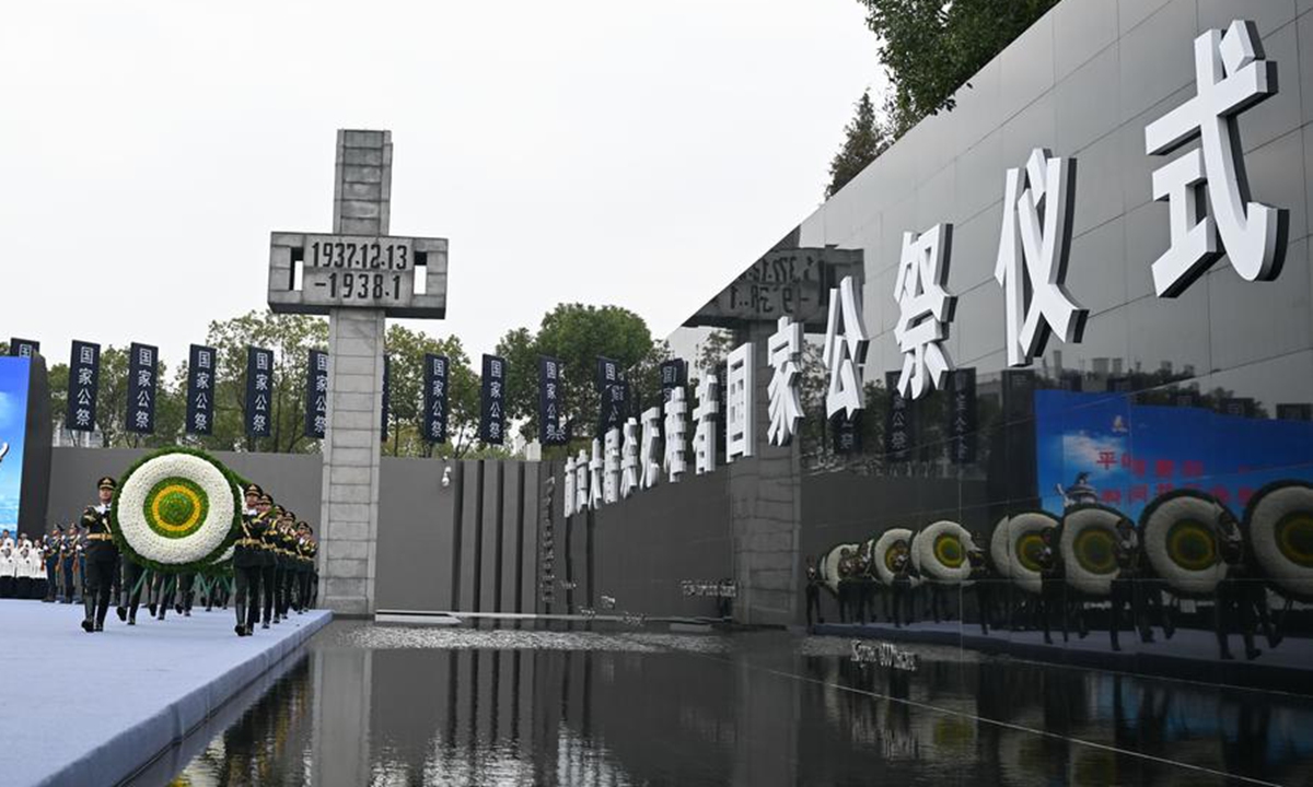 China holds its 10th national memorial ceremony for the Nanjing Massacre victims at the Memorial Hall of the Victims in Nanjing Massacre by Japanese Invaders in Nanjing, capital of east China's Jiangsu Province, Dec. 13, 2023.  (Xinhua/Ji Chunpeng)