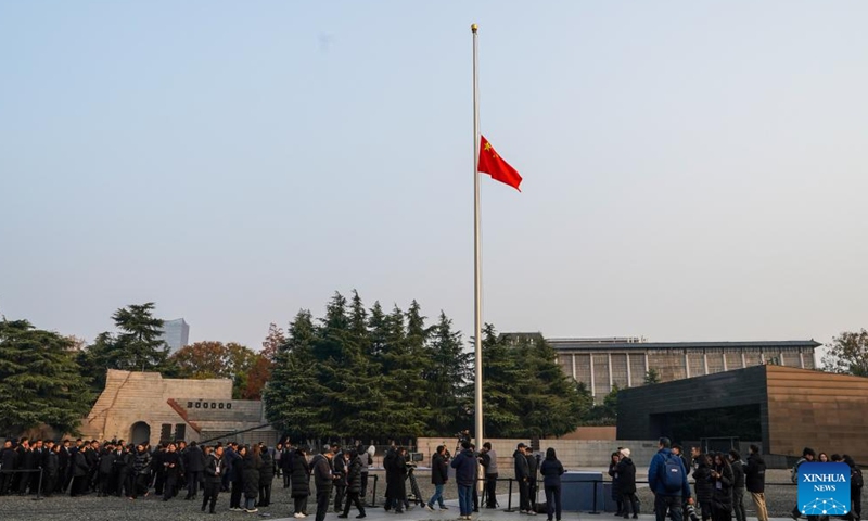 China's national flag flies at half mast at the Memorial Hall of the Victims in Nanjing Massacre by Japanese Invaders in Nanjing, capital of east China's Jiangsu Province, Dec. 13, 2024. Friday marks the 11th national memorial ceremony for the Nanjing Massacre victims. (Xinhua/Li Bo)