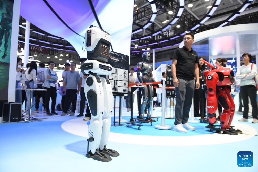 A tech firm demonstrates the walking capability of an SA01 bipedal robot during the 26th China High-Tech Fair (CHTF) in Shenzhen, south China's Guangdong Province, Nov. 14, 2024. The Guangdong-Hong Kong-Macao Greater Bay Area, with its outstanding capabilities in research and development and solid foundation for manufacturing, serves as a fertile ground for the development of humanoid robot sector. (Photo: Xinhua)