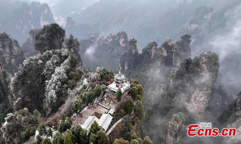 Rime-covered forest at Zhangjiajie National Forest Park, a UNESCO world heritage site, looks like an ink wash painting at Huangshi Village, central China's Hunan Province, Dec. 11, 2024. (Photo: China News Service)