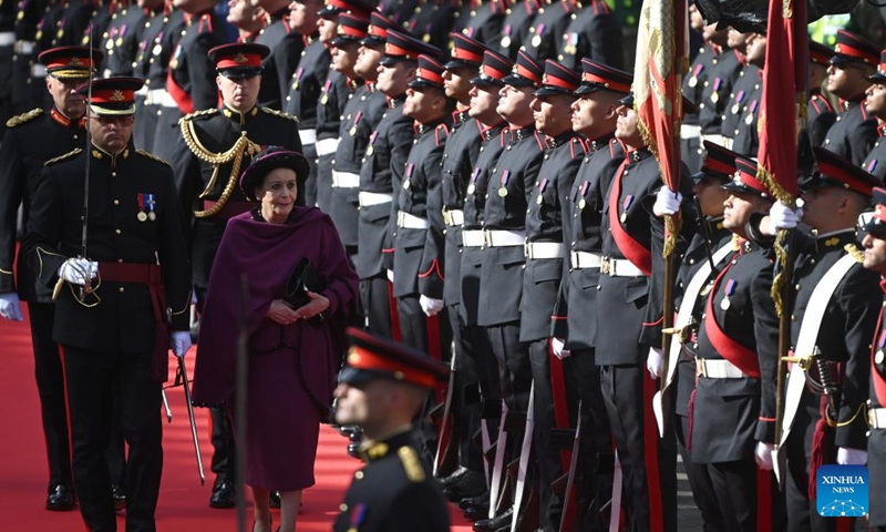 Maltese President Myriam Spiteri Debono inspects the guard of honor during a ceremonial parade by the Armed Forces of Malta in celebration of the 50th anniversary of the Republic of Malta in Valletta, Malta, on Dec. 13, 2024.  (Photo: Xinhua)