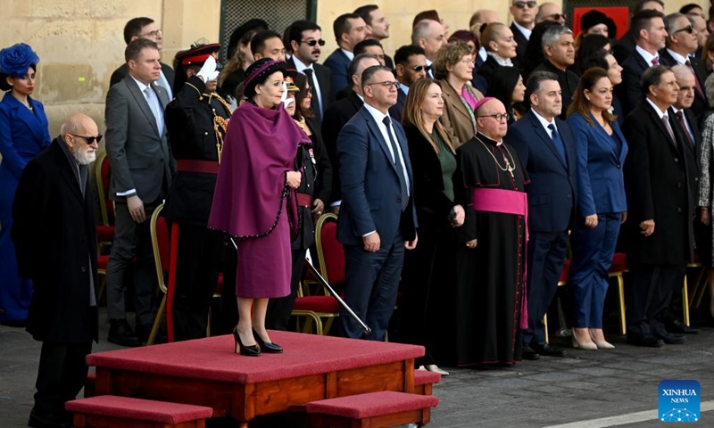 Maltese President Myriam Spiteri Debono (front) attends a ceremonial parade by the Armed Forces of Malta in celebration of the 50th anniversary of the Republic of Malta in Valletta, Malta, on Dec. 13, 2024. (Photo: Xinhua)