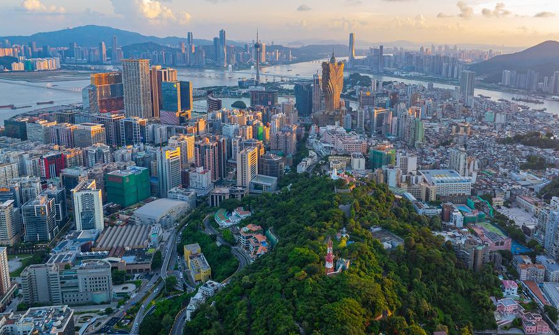 An aerial drone photo shows the Macao Peninsula (front) on July 8, 2024. (Xinhua/Cheong Kam Ka)