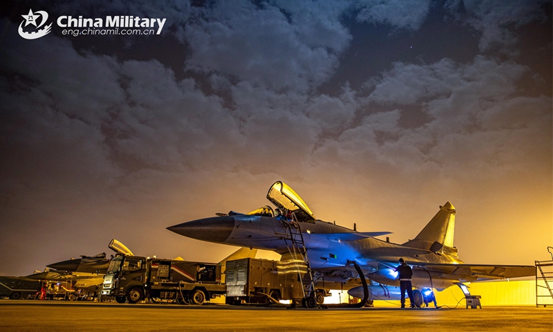 Maintenance members assigned to an aviation brigade with the air force under the Chinese PLA Southern Theater Command conduct pre-flight check on J-10 multi-role fighter jets during a flight training exercise on November 19, 2024. (eng.chinamil.com.cn/Photo by Wang Guoyun)