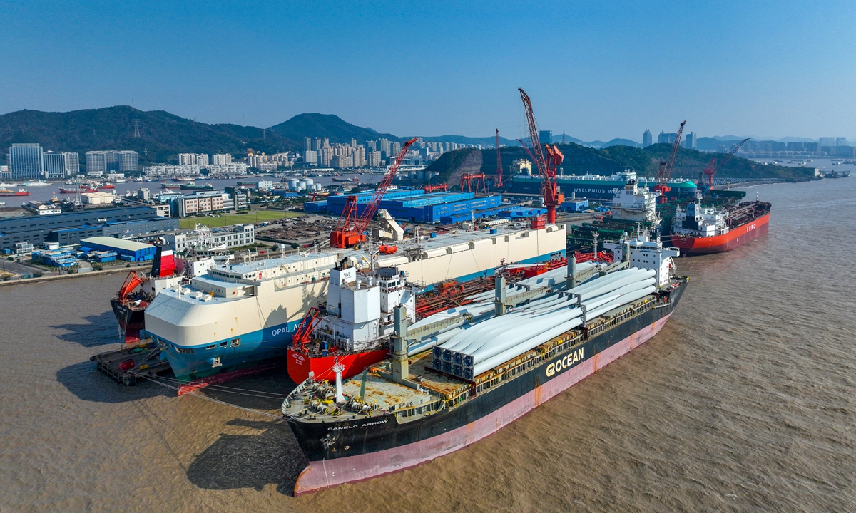 Workers race against time to repair vessels at a ship repair enterprise in Zhoushan, East China's Zhejiang Province, on December 15, 2024. From January to October 2024, the volume of ships repaired in Zhoushan accounted for around 40 percent of the nation's total, with foreign ship repairs making up over 45 percent of the national total, according to data from the Zhoushan municipal government. Photo: VCG