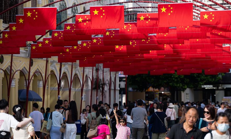 Tourists visit the Senado Square in Macao, south China, Oct. 1, 2024. (Xinhua/Cheong Kam Ka)