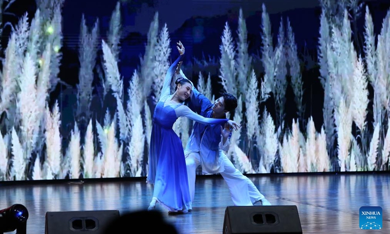 Chinese artists from Wuxi City in east China's Jiangsu Province perform during a Cambodia-China cultural show in Phnom Penh, Cambodia on Dec. 15, 2024. The Golden Promise 2024, a China-Cambodia cultural show, was staged here Sunday evening to celebrate the people-to-people exchange year, attracting hundreds of spectators. (Photo by Phearum/Xinhua)