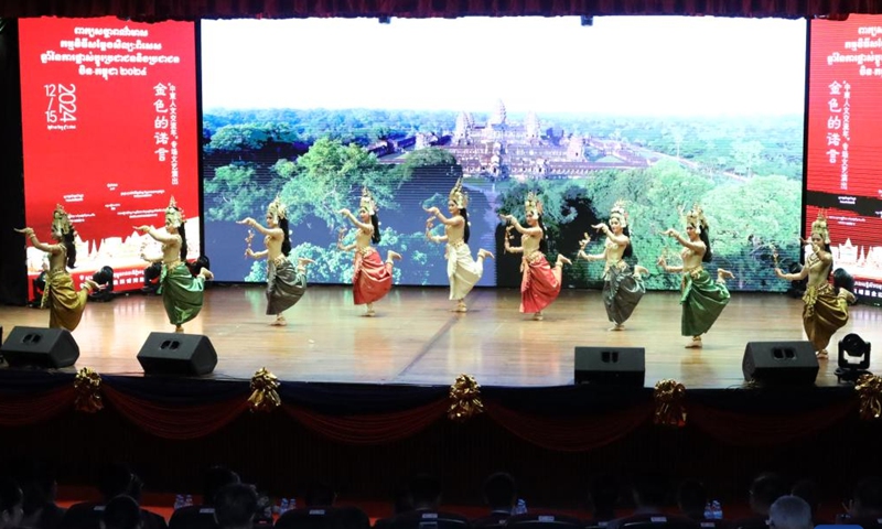 Cambodian artists perform during a Cambodia-China cultural show in Phnom Penh, Cambodia on Dec. 15, 2024. The Golden Promise 2024, a China-Cambodia cultural show, was staged here Sunday evening to celebrate the people-to-people exchange year, attracting hundreds of spectators. (Photo by Phearum/Xinhua)