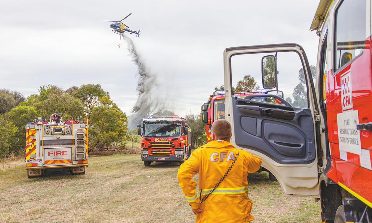 Firefighters battle a grassfire at Westgate Park in Melbourne, Australia on December 16, 2024. Extreme heat warnings are in place for multiple states as a sweltering heatwave brings one of the hottest December days in years. Photo: IC