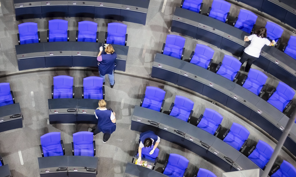 The plenary chamber of the German Bundestag is cleaned early on December 16, Berlin, Germany. On the day, German Chancellor Olaf Scholz has lost a vote of confidence in parliament, paving the way for early elections on 23 February. Scholz calculated that triggering an early election was his best chance of reviving his party's political fortunes, according to media report. Photo: VCG