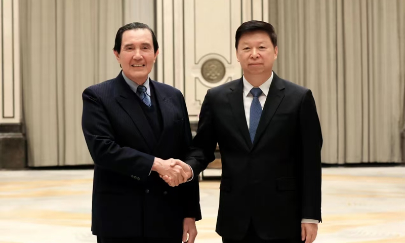 Song Tao (right), head of both the Taiwan Work Office of the Communist Party of China Central Committee and the Taiwan Affairs Office of the State Council, shakes hand with former chairman of the Chinese Kuomintang party Ma Ying-jeou in Harbin, Heilongjiang Province on December 18, 2024. Photo: taiwan.cn