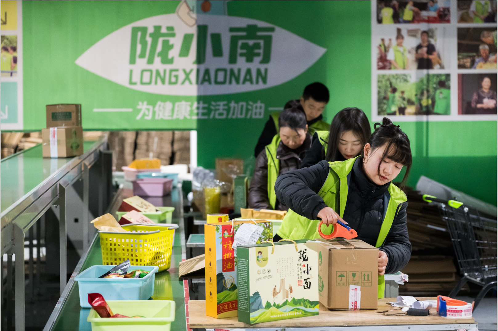 In the packaging workshop of Longxiaonan E-commerce Company's distribution center in Chengxian, agricultural specialties are being packaged and are prepared for distribution, on December 10, 2024. Photo: Chen Tao/GT