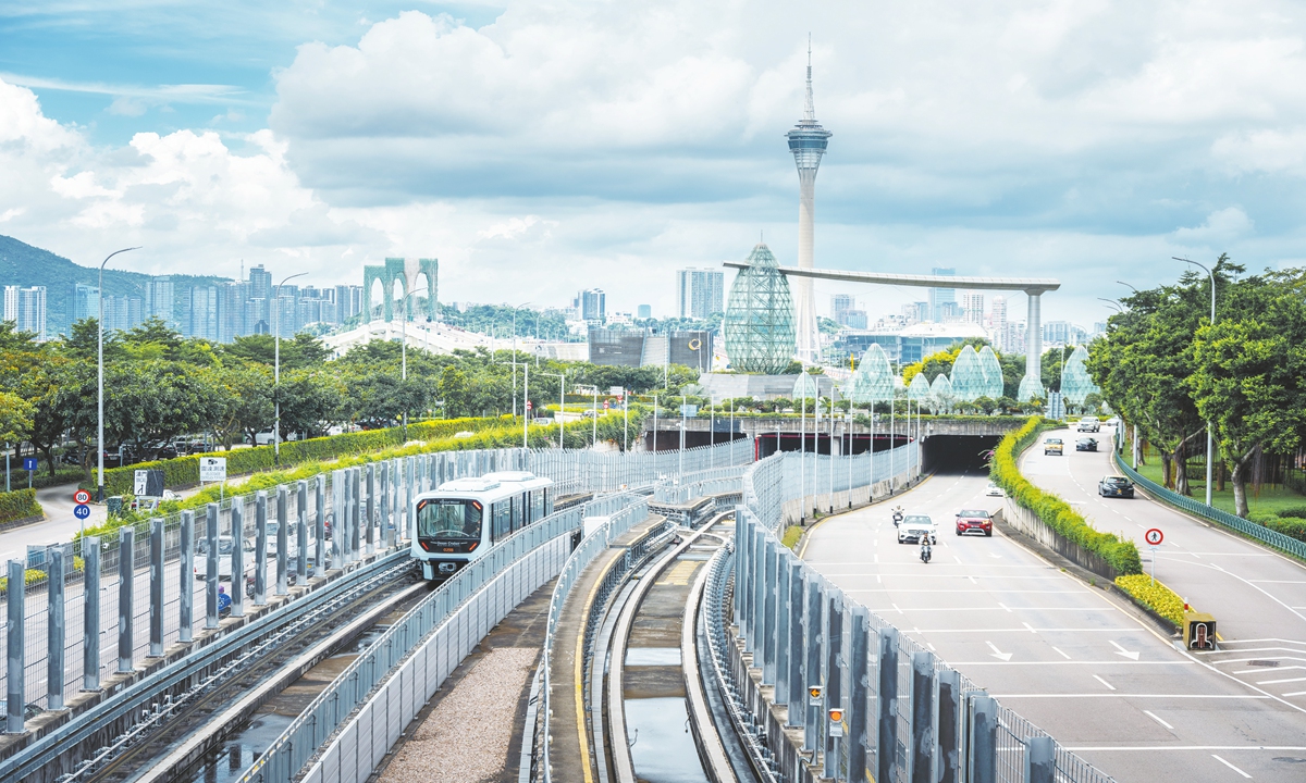 A light rapid transit train passes through Macao. Photo: VCG