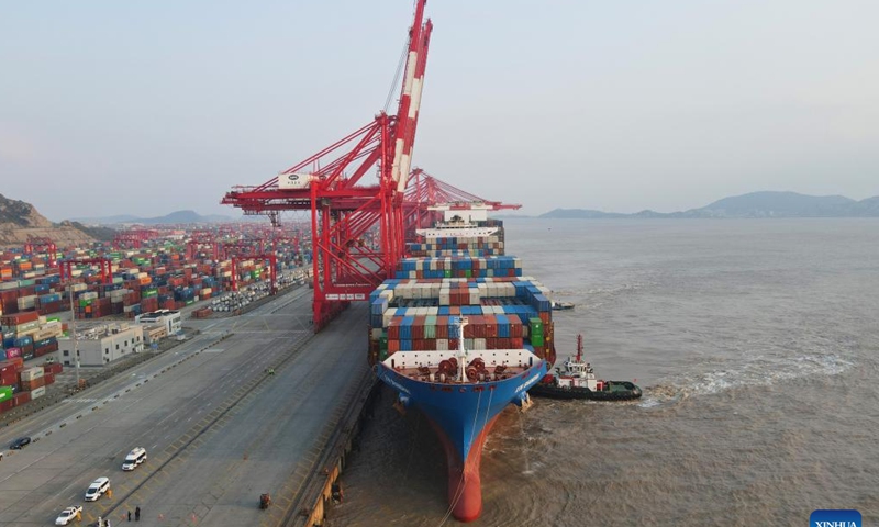 An aerial drone photo shows the Xin Shanghai, a vessel operated by China COSCO Shipping Corporation Limited, berthed at Yangshan Port, east China's Shanghai, Dec. 18, 2024.

The Xin Shanghai arrived in Shanghai's Yangshan Port on Wednesday afternoon after a 23-day journey from Peru's Chancay Port, marking the first official voyage between the two ports.

The journey opened the first two-way operational sea link between Shanghai and Chancay Port, a newly-inaugurated flagship project of Belt and Road cooperation between China and Peru. (Xinhua/Fang Zhe)