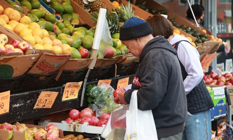 Customers shop at a grocery store in New York, the United States, on Dec. 11, 2024.  (Xinhua/Liu Yanan)