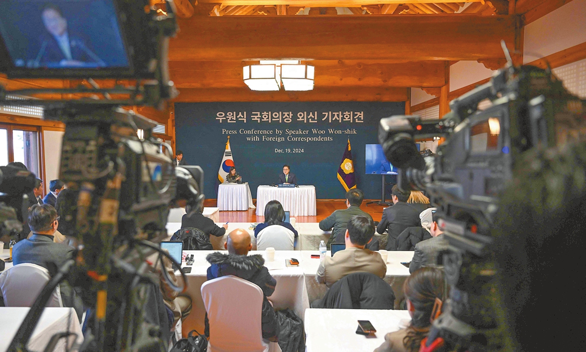 South Korean National Assembly Speaker Woo Won-shik holds a press conference with foreign correspondents at the National Assembly in Seoul on December 19, 2024, after the impeachment of South Korean President Yoon Suk-yeol. 