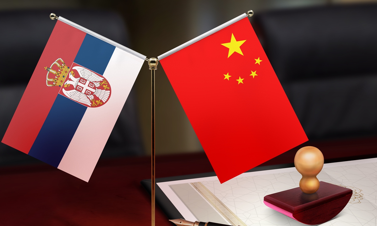 China Serbia flags Photo: VCG