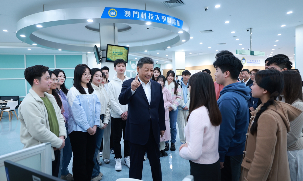 Chinese President Xi Jinping visits the Macau University of Science and Technology on December 19, 2024 and talks with teachers, students and scientific researchers there. Photo: Xinhua