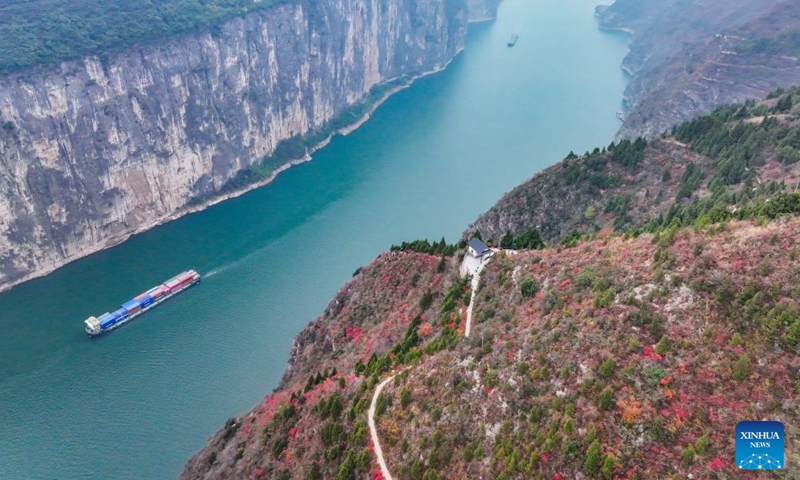 An aerial drone photo shows ships sailing in Qutang Gorge, one of the Three Gorges on the Yangtze River, in Fengjie County, southwest China's Chongqing Municipality, Dec. 19, 2024. (Xinhua/Wang Quanchao)