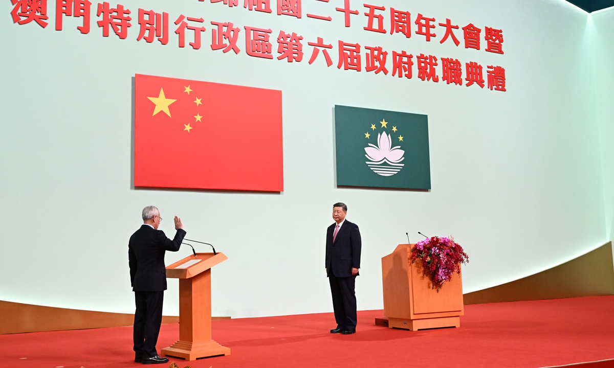 Chinese President Xi Jinping, also general secretary of the Communist Party of China Central Committee and chairman of the Central Military Commission, administers the oath of office to Sam Hou Fai, new chief executive of the Macao Special Administrative Region, at the Macao East Asian Games Dome in Macao, South China, on December 20, 2024. Photo: Xinhua