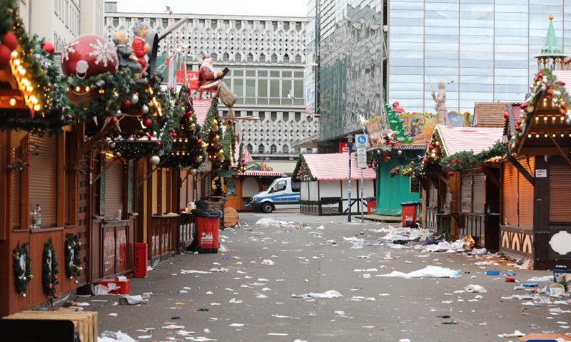 This photo taken on Dec. 21, 2024 shows a Christmas market where a car rammed into a crowd in Magdeburg, Germany. At least five people were killed and over 200 others injured after a car rammed into a large crowd at a German Christmas market in the central German city of Magdeburg Friday evening, German news agency dpa reported Saturday, citing State Premier Reiner Haseloff. German Chancellor Olaf Scholz expressed deep concerns over the tragic incident at the scene, saying that nearly 40 of the injured are so seriously hurt that we must be very worried about them. (Xinhua/Du Zheyu)