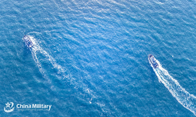 Tugboats attached to a naval base under the Chinese PLA Northern Theater Command sail on the sea after separating from the minesweeper Changyi (Hull 739) during a maritime training exercise in December 1, 2024. (eng.chinamil.com.cn/Photo by Li Huaqun)