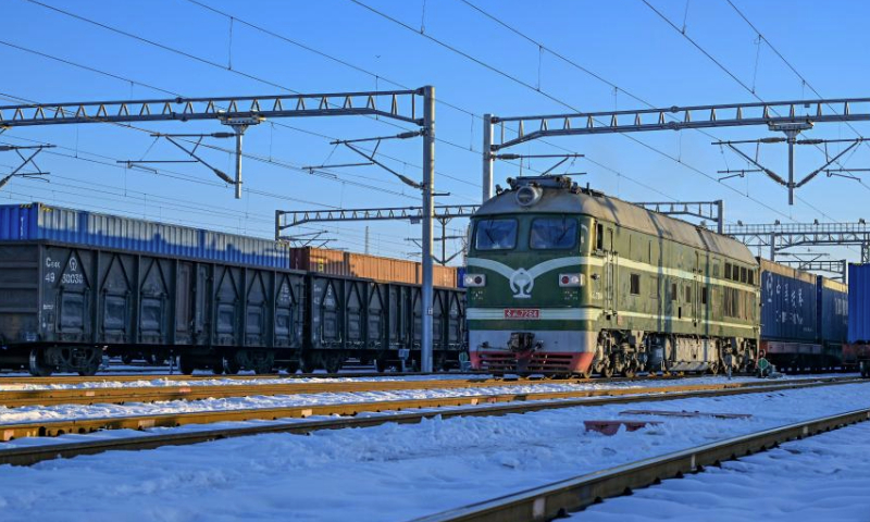 This photo taken on Dec. 25, 2024 shows a view of the standard-gage yard of Horgos railway port in Horgos, northwest China's Xinjiang Uygur Autonomous Region.

Horgos Port, a major railway hub in Xinjiang, has facilitated 8,541 China-Europe freight train trips by Dec. 24 this year, according to statistics from the railway department of Horgos Port. (Xinhua/Chen Shuo)