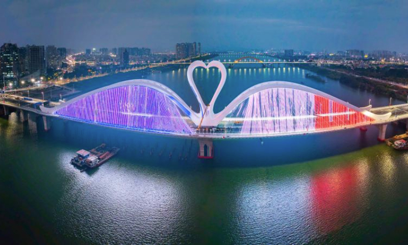 This stitched aerial drone photo taken on Dec. 27, 2024 shows Echeng (nickname of Huizhou, meaning the city of goose) Bridge in Huizhou, south China's Guangdong Province. The 1,119.5-meter-long Echeng Bridge was put into operation on Saturday. (Photo by Zeng Kaigang/Xinhua)