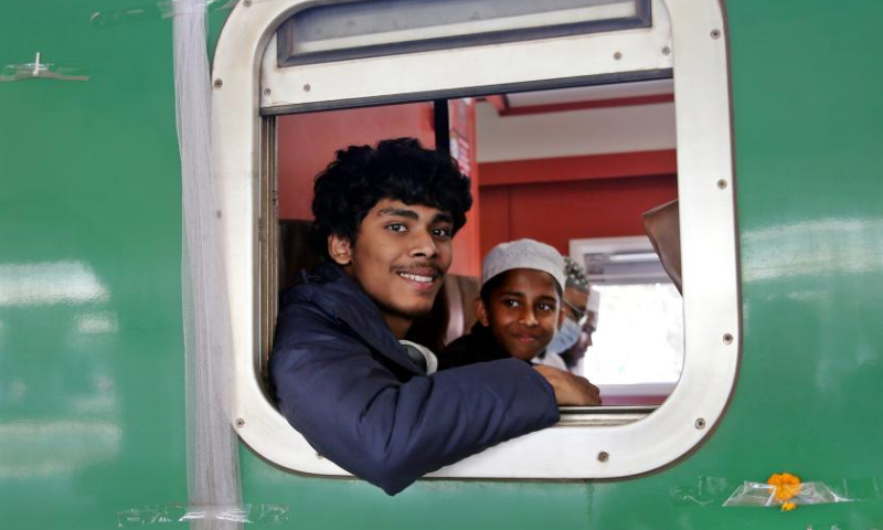 People are pictured inside a train of the Padma Bridge Rail Link Project (PBRLP) at Dhaka station, Dhaka, Bangladesh, Dec. 24, 2024. With the first train decorated with colorful ribbons arriving at Dhaka station, Bangladesh's largest railway Padma Bridge Rail Link Project (PBRLP) officially opened across its entire line to traffic here Tuesday.

The PBRLP, one of the significant projects under the Belt and Road Initiative (BRI) in Bangladesh, was built by the China Railway Group Limited (CREC) and funded by the Export-Import Bank of China.

The railway, known locally as the Dream Road, stretches approximately 170 km. Following its opening, travel time between the capital Dhaka and the southwestern city of Jashore will be reduced from the original 10 hours to just three hours. (Xinhua)